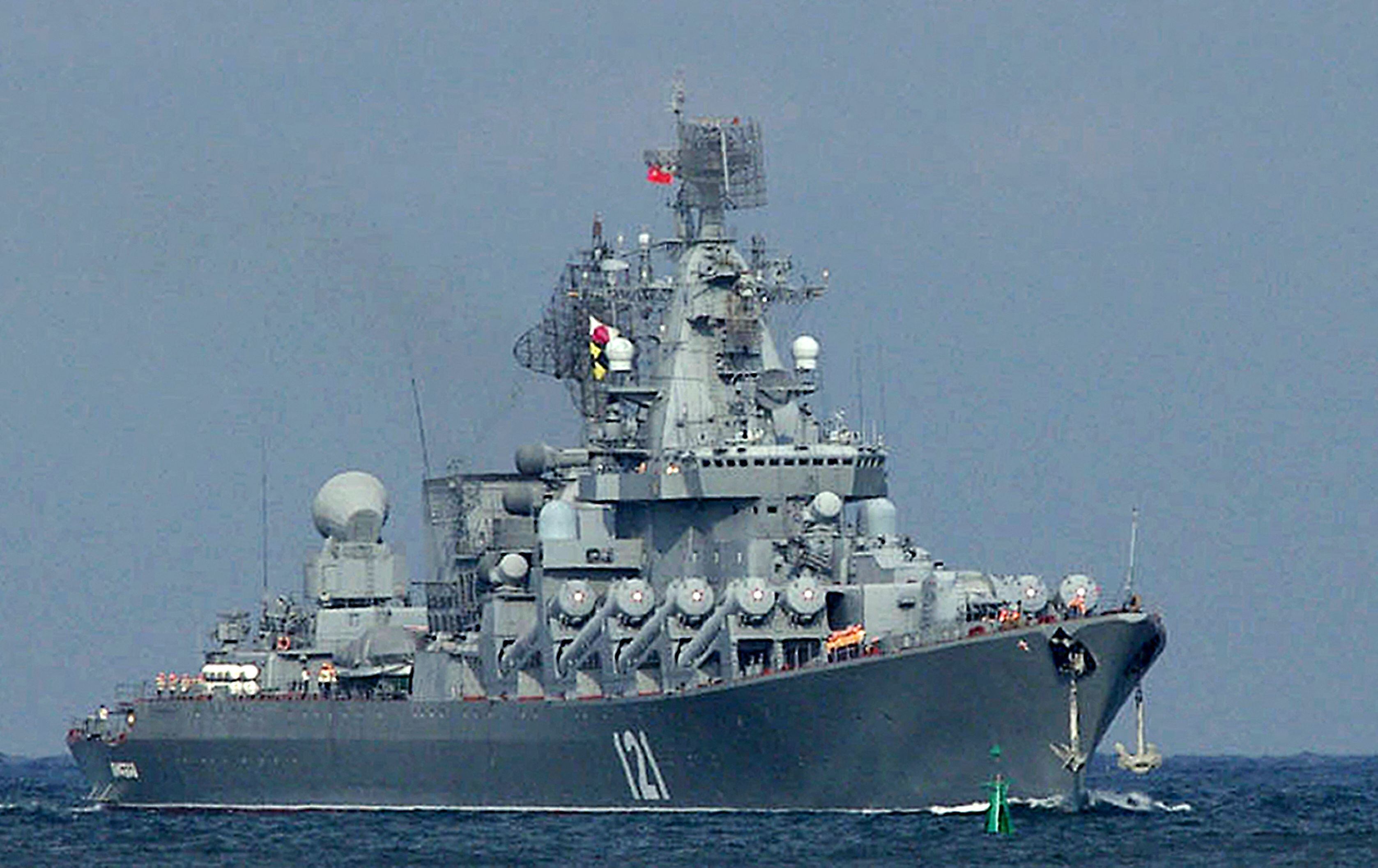 (FILES) This file photo taken on August 29, 2013 shows the Moskva, missile cruiser flagship of Russian Black Sea Fleet, entering Sevastopol bay. - Russia's Black Sea flagship involved in the naval assault on Ukraine has been "seriously damaged" by an explosion, state media reported April 14, 2022, as Moscow threatened to strike Kyiv's command centres. "As a result of a fire, ammunition detonated on the Moskva missile cruiser. The ship was seriously damaged," the Russian defence ministry was quoted as saying, adding that the cause of the fire was being determined and that the crew had been evacuated. (Photo by Vasiliy BATANOV / AFP)