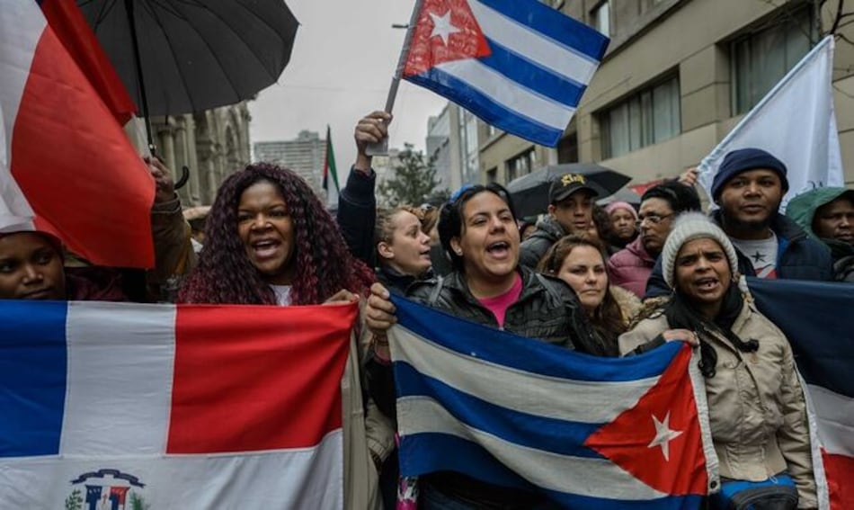 Inmigrantes protestan en Chile en contra de políticas migratorias de Piñera