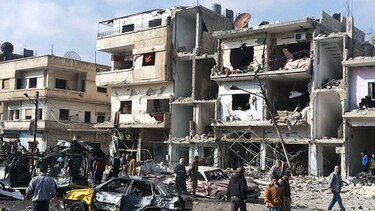Más de un centenar de muertos en varios atentados en Homs y Damasco
