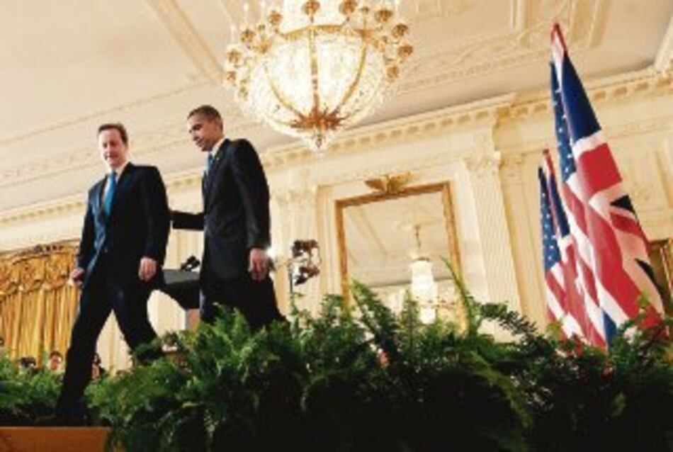 Cameron intenta calmar enojo de EU