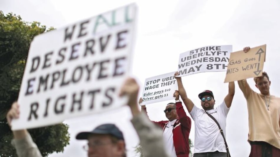 Conductores de Uber protestan por salarios bajos