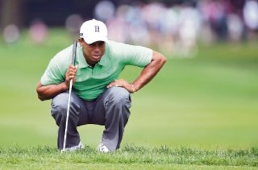 Tiger Woods termina como el mejor golfista de la campaña 2013