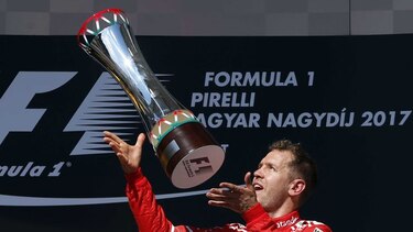 Vettel se sobrepone a problema mecánico y gana GP de Hungría