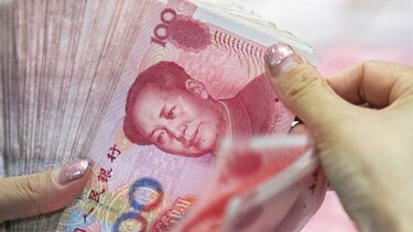 Reducen previsión de crecimiento de China por aranceles