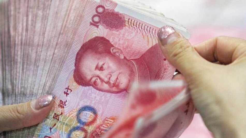 Reducen previsión de crecimiento de China por aranceles