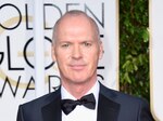 Moore y Redmayne ganan Globo de Oro a mejor actriz y actor