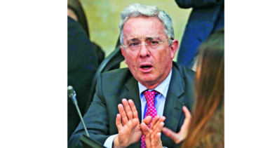 Santos y Uribe se reúnen hoy