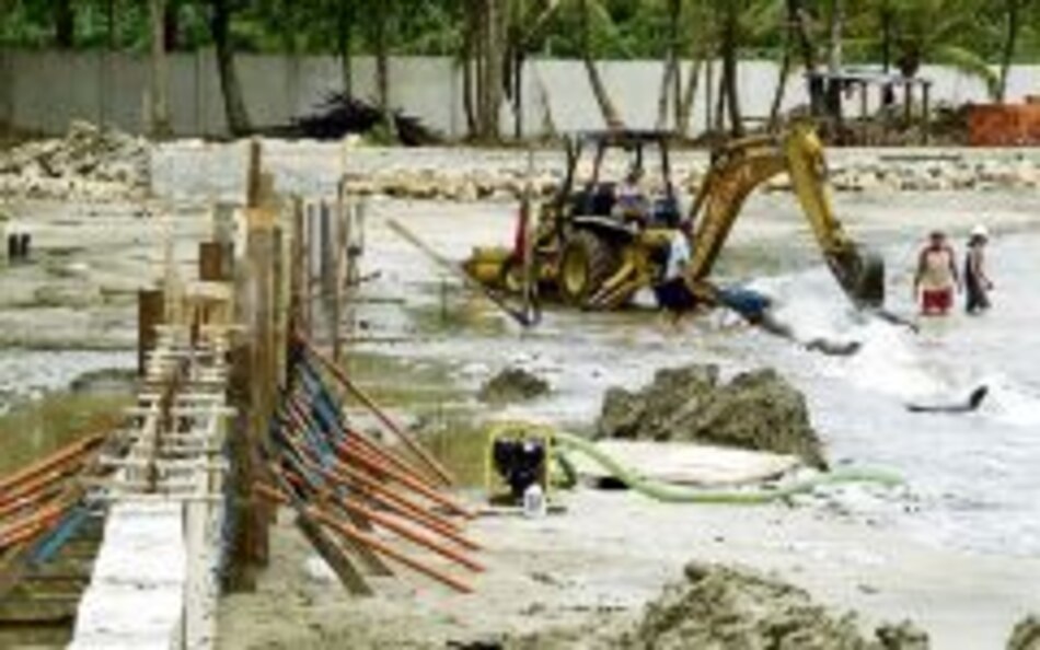 Muro privado en la playa