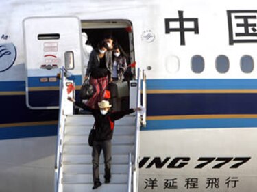 Vuelven a México los mexicanos retenidos en China