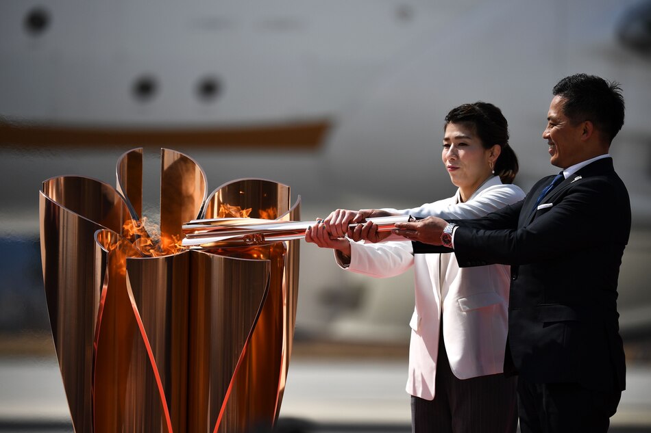 La llama olímpica aterrizó en Japón acompañada de muchas dudas