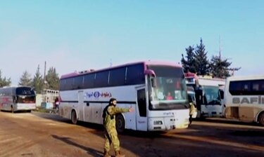 Cientos de civiles y combatientes evacuados de cuatro ciudades de Siria