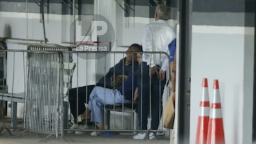 Budy Attie y Luis Oliva llegan custodiados y esposados a la DIJ