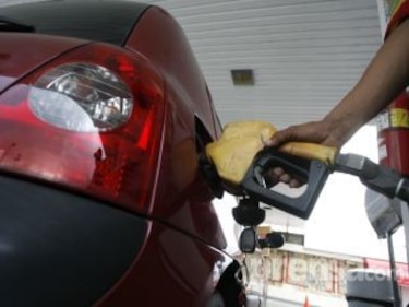 Año Nuevo comenzará con alza de 11 centésimos en el galón de gasolina