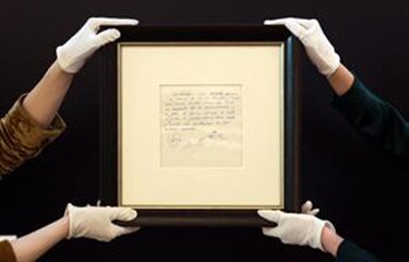 Subastan la servilleta con el contrato de Messi