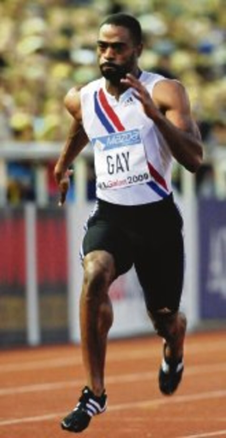 Tyson Gay hizo morder el polvo a Asafa Powell