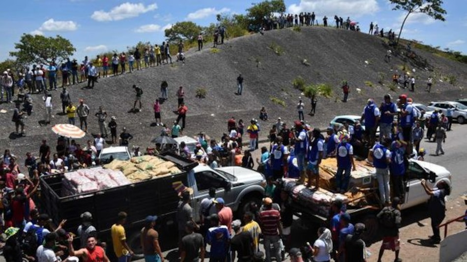 Buscan ingresar ayuda a Venezuela, pese a los choques en la frontera