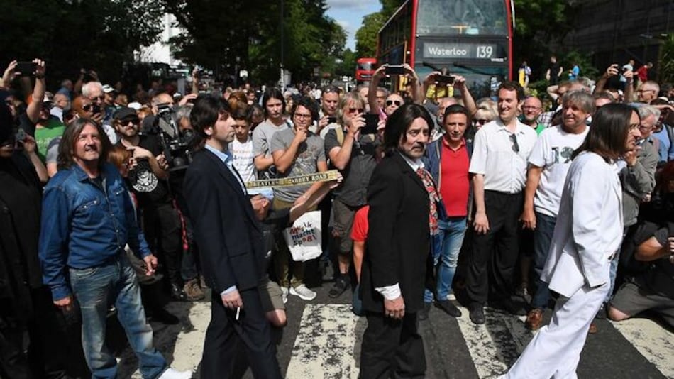 Fanes de Los Beatles celebran el aniversario 50 de la foto de Abbey Road