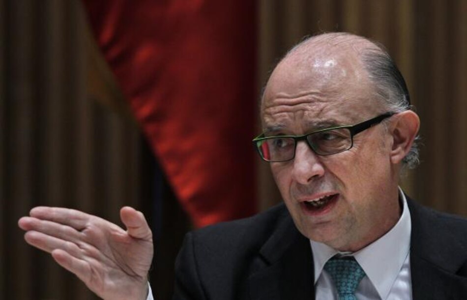 Deuda española se eleva por ayuda a banca y regiones