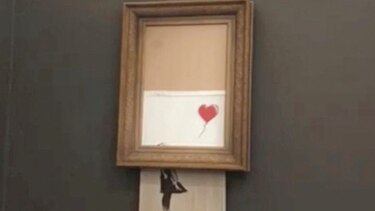 Obra de Banksy se autodestruye tras ser vendida