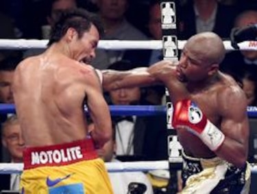 Pacquiao dice que lesión en el hombro le afectó en la pelea