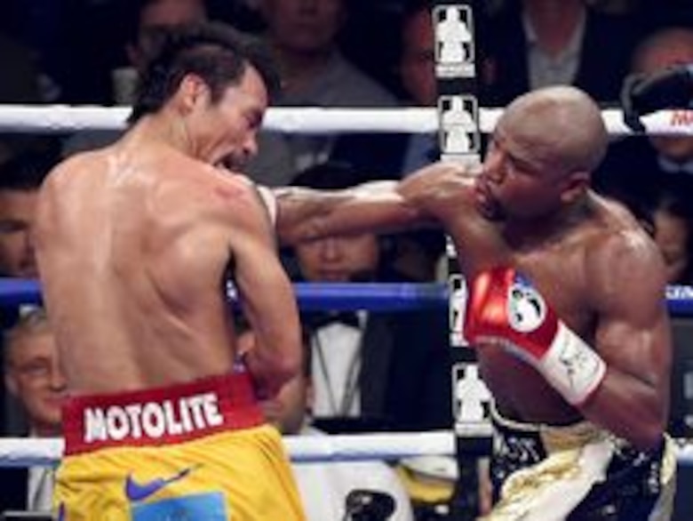 Pacquiao dice que lesión en el hombro le afectó en la pelea