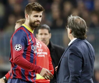 Piqué y Costa se retiran lesionados en duelo de la Champions