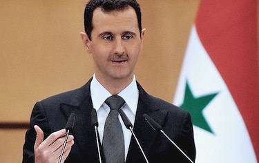 Al Asad responde a Kerry que espera hechos y que luego decidirá