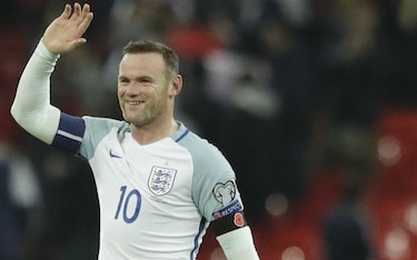 Rooney pide perdón por su conducta tras ser fotografiado ebrio