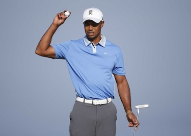 Woods se retira de dos torneos por problemas de espalda