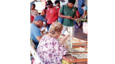 Fiscalía busca información en sede de la Lotería Nacional