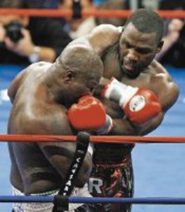 Hasim Rahman empata y retiene su título del CMB