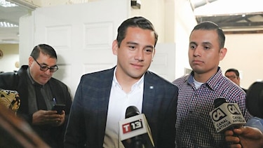 Absuelven a hijo y hermano de Jimmy Morales
