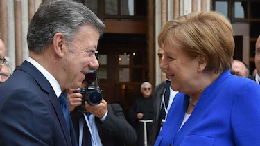 Santos y Merkel se comprometen a trabajar por la paz y la reconciliación