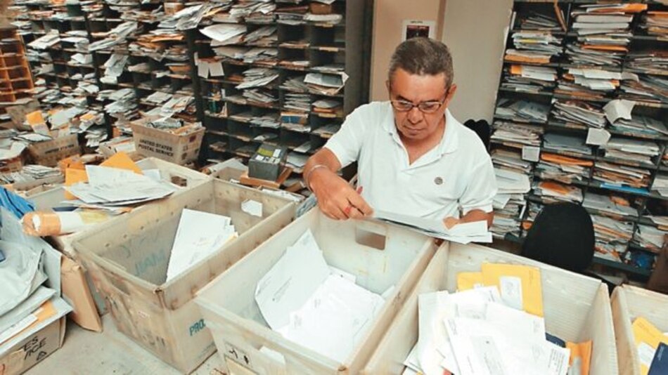 Correos suspende envío de carga a EU