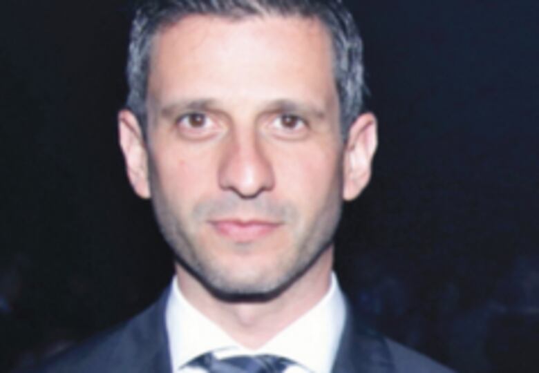 Dinero estatal pagó deudas de Henri Mizrachi con la Caja de Ahorros