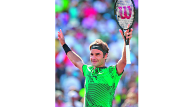 Federer y Wozniacki avanzan
