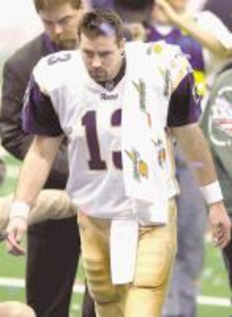 Kurt Warner conversa con los New York Giants