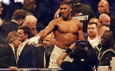 Joshua  intenta convertirse en campeón absoluto de los pesos pesados