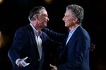 Macri y Fernández cierran campañas electorales en Argentina