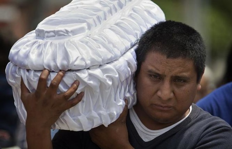 Elevan a 85 los muertos en Guatemala y suspenden la búsqueda