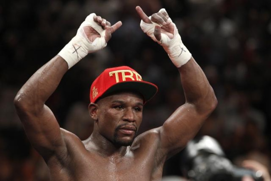 Mayweather Jr. venció a Maidana por decisión mayoritaria y mantuvo el invicto