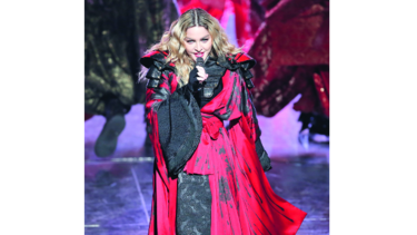 Madonna visita por sorpresa albergues