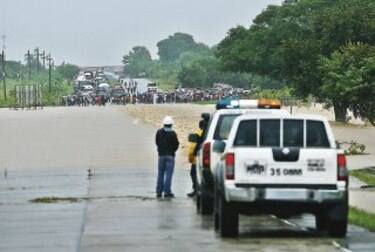 Lluvias desbordan el río Grande