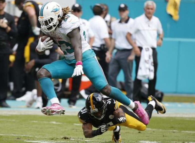 Brady y Patriots derrotan a Bengals; Dolphins frenan a Steelers